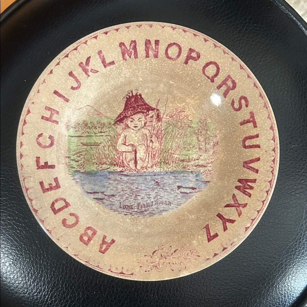 Vintage antique child ABC plate. Called lone fisherman & is a little boy fishing